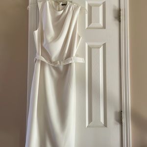 Marciano size small white dress worn once .  Dress is fully lined with belt.